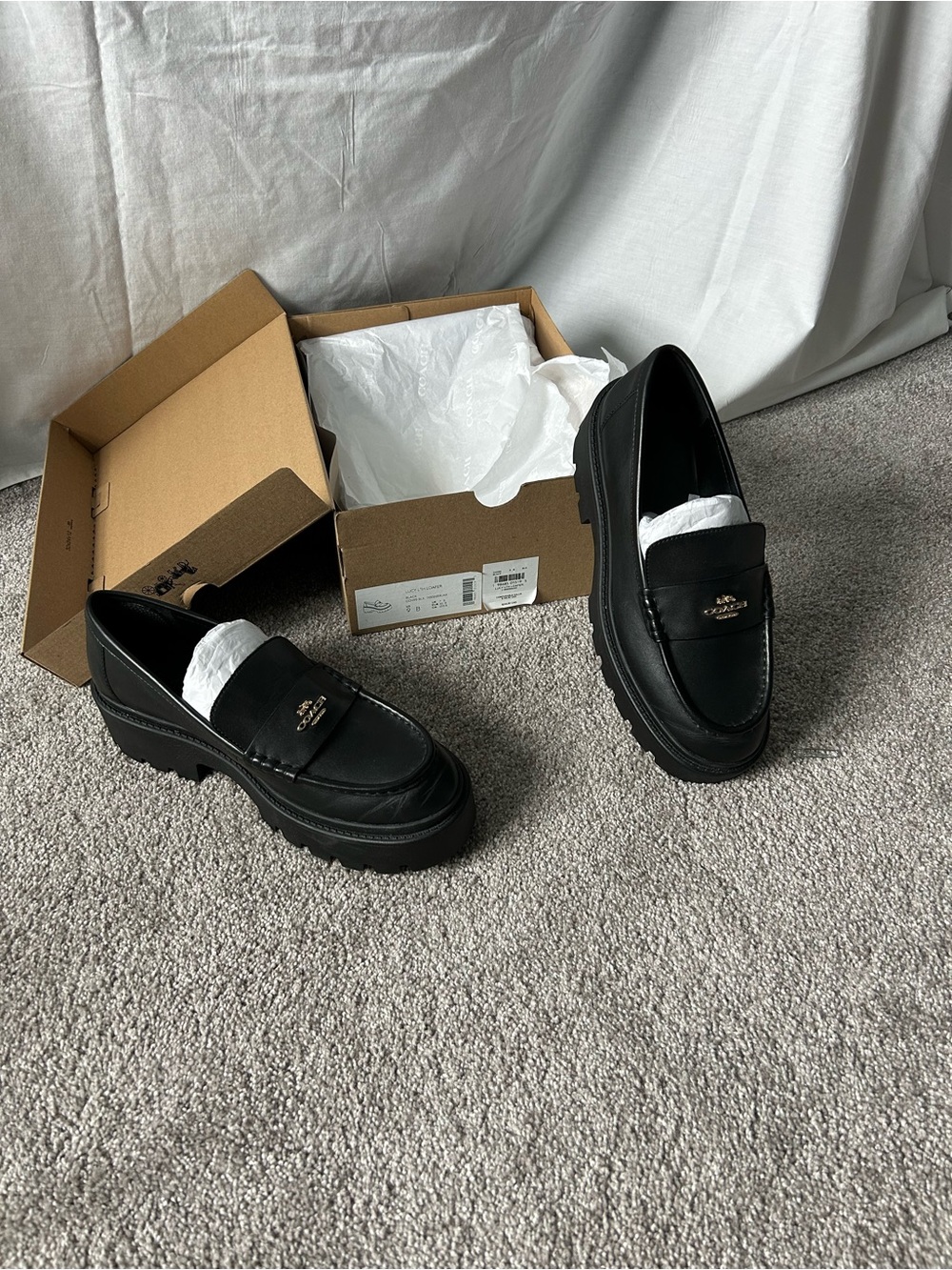 Coach Women’s Black Leather Lug-Sole Loafers